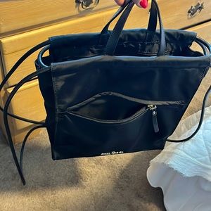 Black nylon Kate Spade bad. Can be used as tote or backpack. Great shape